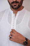 White Chikan fabric kurta with white pajama in cotton silk